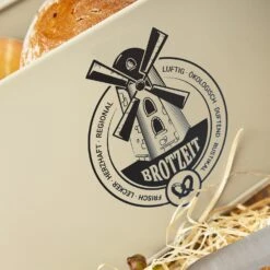 Stigby 2-in-1 Brotkasten Mit Schneidebrett Metallblech Bambus 12 Stigby 2-in-1 Brotkasten Mit Schneidebrett Metallblech Bambus -Klarstein 10038107 yy 0004 logo