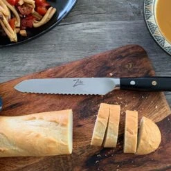 Alpha-Royal Japanese Serie 5,5" Allzweckmesser Wellen Damast-Stahl -Klarstein 10038997 de 0003 logo